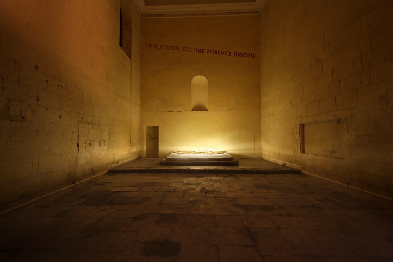 Grimanesa Amorós GOLDEN UROS, 11-foot LED sculpture and light sculpture at the Chapelle de la Persévérance, A-PART Contemporary Art Festival, Tarascon, France, 2011. Golden dome forms in LEDs interpreting the floating Uros Islands of Peru fill an intimate historic stone chapel, silkscreened with Amorós's golden self-portrait as a deity, exploring the duality of ancient Incan beliefs and universal spirituality. Light sculpture by Grimanesa Amorós.