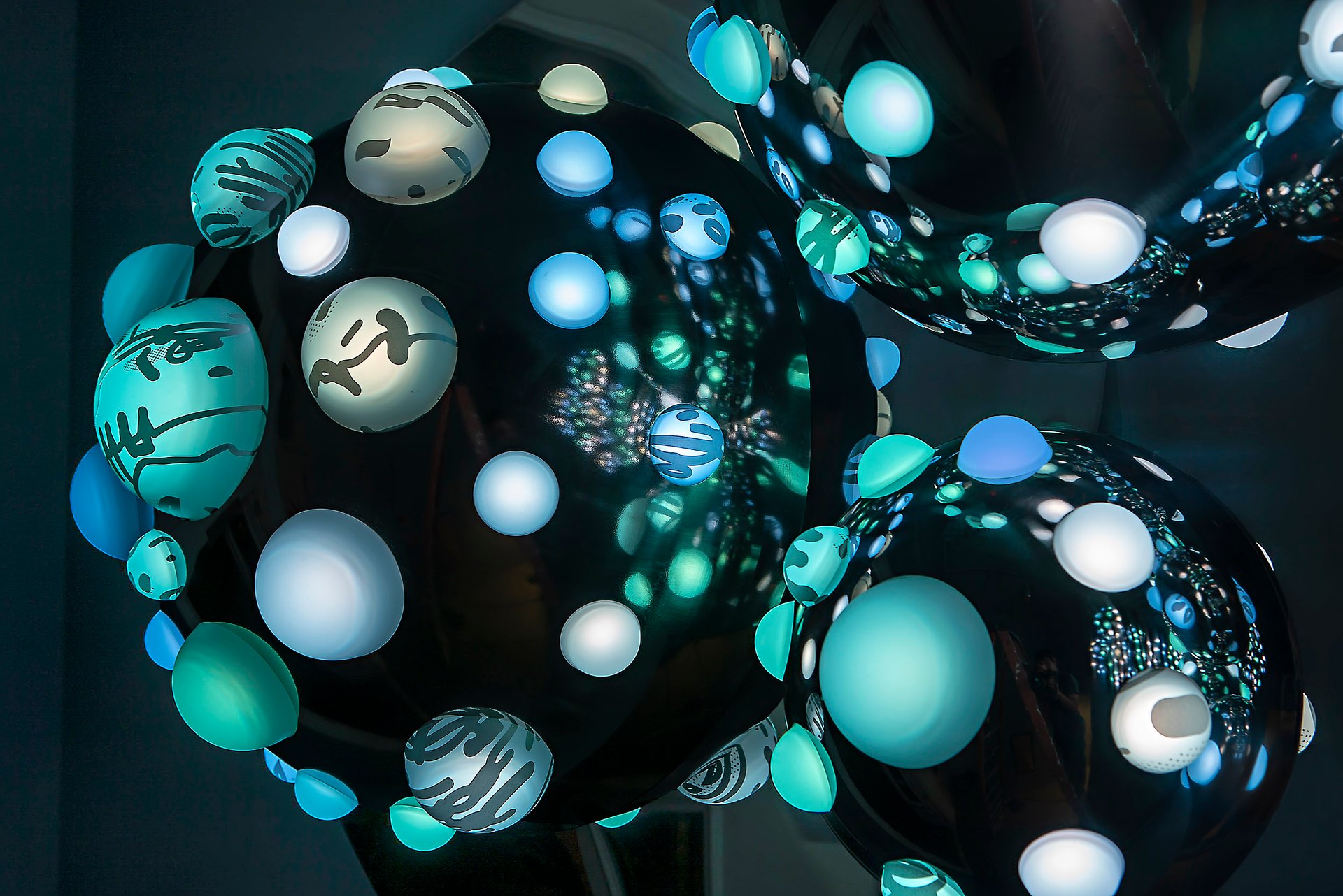 Grimanesa Amorós ARGENTUM, 9 x 5 ft 4 in x 5 ft 4 in LED sculpture and light sculpture now in the permanent collection of The Bronx Museum of the Arts, Bronx, New York, 2024. Made of stainless steel, diffusion and reflective material, LEDs, and custom lighting sequence, its two interlocking sections embody the geographic and cultural bond between Manhattan and the Bronx. Permanent collection exhibition of LED sculpture and light sculpture by Grimanesa Amorós at The Bronx Museum of the Arts.