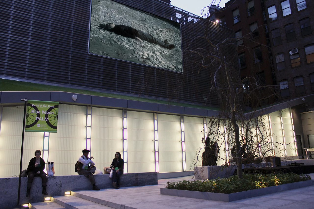 Grimanesa Amorós THE BIG SCREEN PROJECT, 30 x 16.5-foot outdoor site-specific video and LED art presented on the HD format public plaza screen at the Eventi Hotel, Sixth Avenue, Chelsea, New York, 2010 to 2011. Two video works, Between Heaven and Earth and La Procesión, were presented as part of Reflexion Obscura, exploring light, movement, and urban space. Outdoor LED art by Grimanesa Amorós.