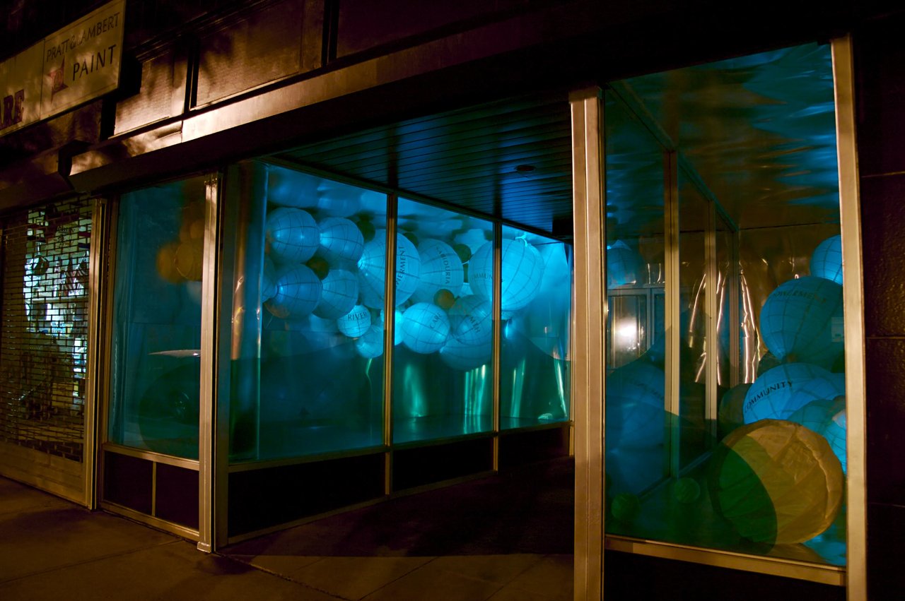 Grimanesa Amorós SUBSTANCIAL phase 4, expanded permanent public art light sculpture and LED art at Sun River Health, New York, 2007. The fourth phase of this ongoing outdoor LED installation continues to honor the women who founded HRHCare through glowing lanterns, bilingual text, and color illuminating the health center's enduring community mission. Outdoor light sculpture by Grimanesa Amorós.