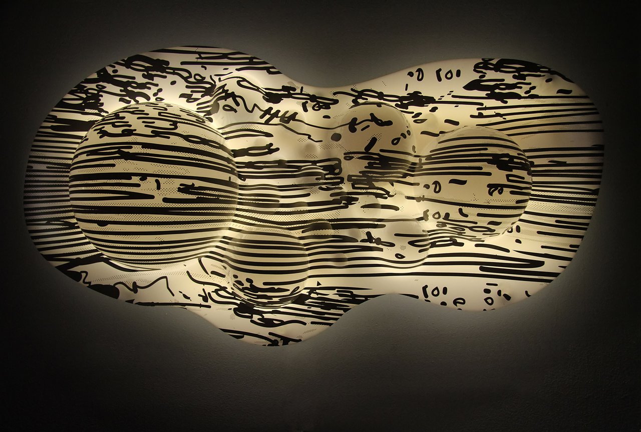 Grimanesa Amorós GOLDEN UROS ISLAND, 24 x 45.5 x 8-inch light sculpture made of LEDs, diffusion material, and custom lighting sequence, interpreting the floating totora reed islands of the pre-Incan Uros people of Puno, Peru, who have built their homes, boats, and watchtowers entirely from dried totora reeds for over 3,000 years, meditating on the ephemeral nature of existence. Light sculpture by Grimanesa Amorós, 2012.