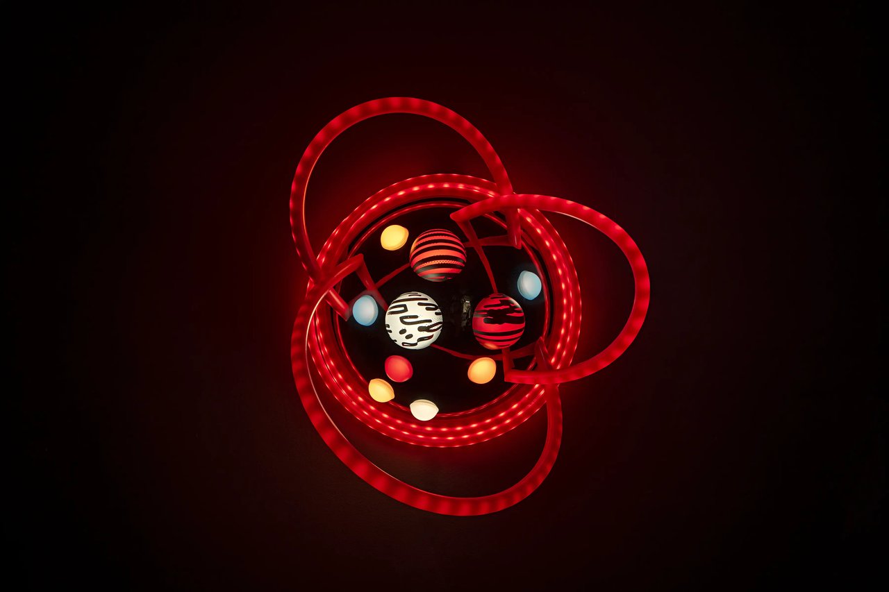 Grimanesa Amorós LOTUS 4, 24 inch by 24 inch by 19 inch light sculpture made of stainless steel, diffusion and reflective material, LEDs, and custom lighting sequence, inspired by the artist's first encounter with a lotus flower in Shanghai and exploring the harmonious dance between light and darkness, stillness and motion, fragility and strength. Light sculpture by Grimanesa Amorós, 2021.