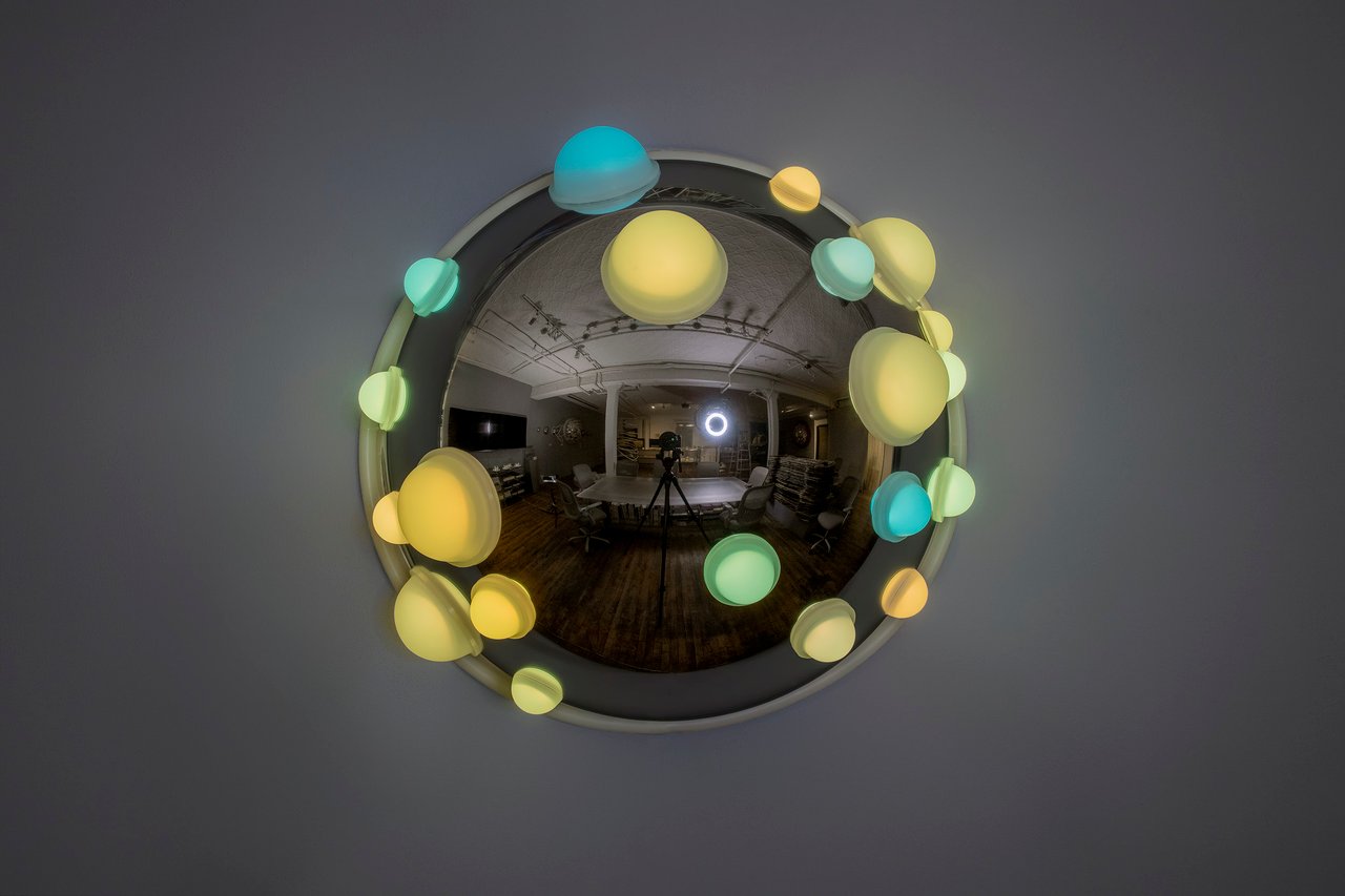 Grimanesa Amorós LUMINOUS PORTRAITS 7, 26 x 26 x 14-inch light sculpture made of stainless steel, diffusion and reflective material, LEDs, and custom lighting sequence, a limited edition series blending vibrant colors and geometric designs from Pre-Columbian textiles and ceramics with smooth metallic textures and futuristic shapes, exploring the relationship between Incan sun ceremonies and the futurist aesthetic and the influence of tradition on our collective future. Light sculpture by Grimanesa Amorós, 2024.
