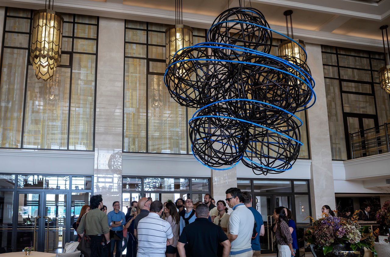 Grimanesa Amorós MARITIME — suspended LED light sculpture in the lobby of The Peninsula Hotel Istanbul, Türkiye. A 15-foot luminous globe-like form evoking the hull of a ship and the seafoam tides of the Bosphorus, referencing Istanbul's centuries of nautical history. Immersive site-specific light installation by Grimanesa Amorós, 2025.