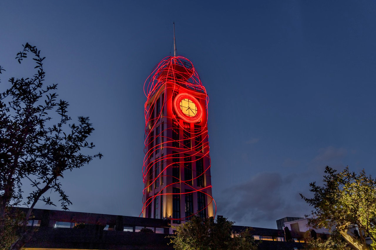 Grimanesa Amorós PASSAGE — site-specific LED light installation on the historic clock tower of The Peninsula Hotel Istanbul, Türkiye. Threads of red illuminate its history as a former passenger transit terminal on the Bosphorus. Large-scale public light sculpture by Grimanesa Amorós, 2025.