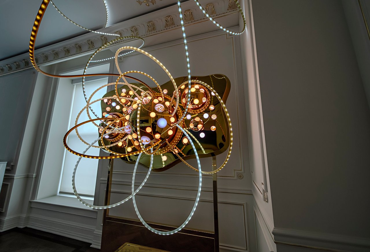 Grimanesa Amorós SOLAR SANCTUARY — light sculpture and LED art installation in New York, NY. A luminous LED sculpture with a golden and warm tonal palette referencing the Incan golden disk of Inti and the quality of sunlight moving through interior space. Site-specific light sculpture grounding an ancient cosmological symbol within the lived experience of the present day, by Peruvian-American light artist Grimanesa Amorós.