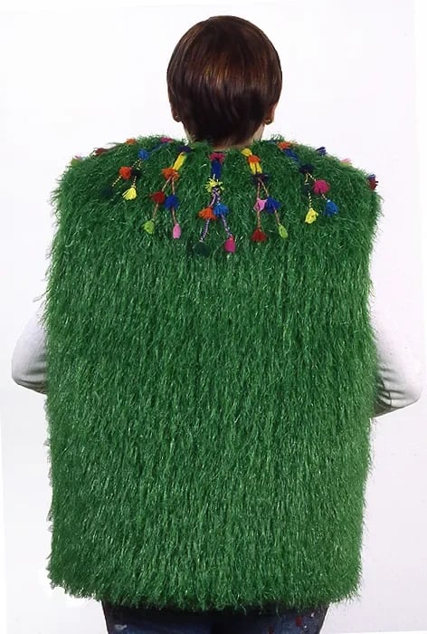 Grimanesa Amorós ART TO WEAR, 26 x 23 x 5-inch wearable artwork made of vest, cloth, plastic, and mixed media, created for In-VESTments: Artist-Made Vests as part of The Body Eclectic exhibition organized by director Joan Burge Wallick. Exhibited at the Spruill Center for the Arts, Atlanta, Georgia, 1997.