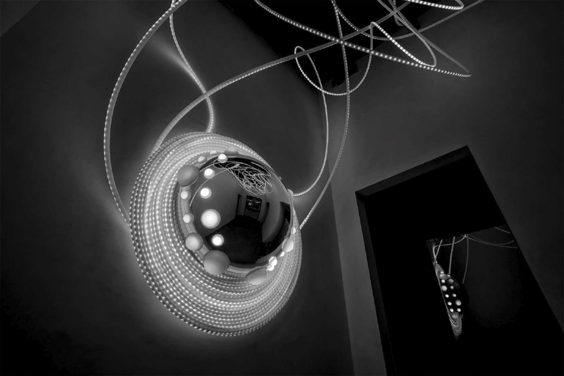 Light sculpture SISTRUM by Grimanesa Amoros in grayscale