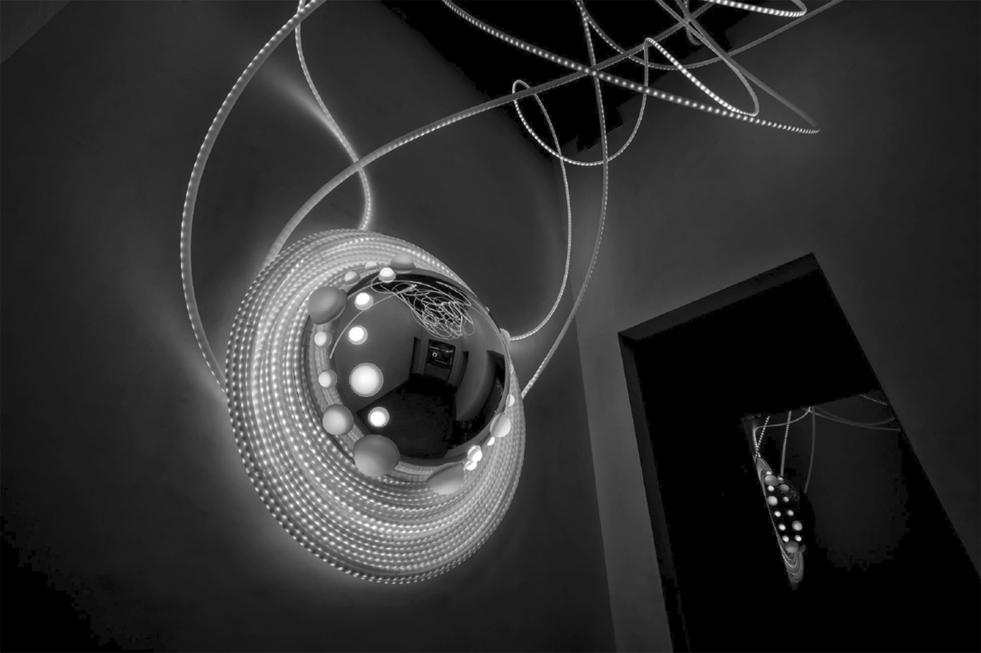 Light sculpture SISTRUM by Grimanesa Amoros in grayscale